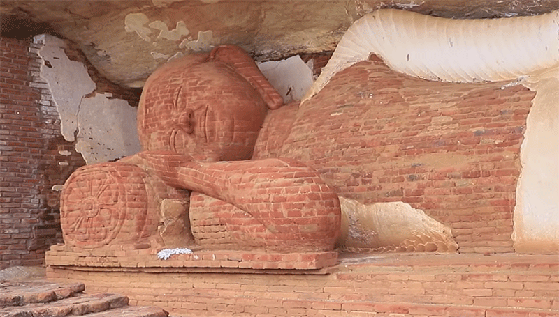 This reclining Buddha statue can be seen on top of the Pidurangala rock
